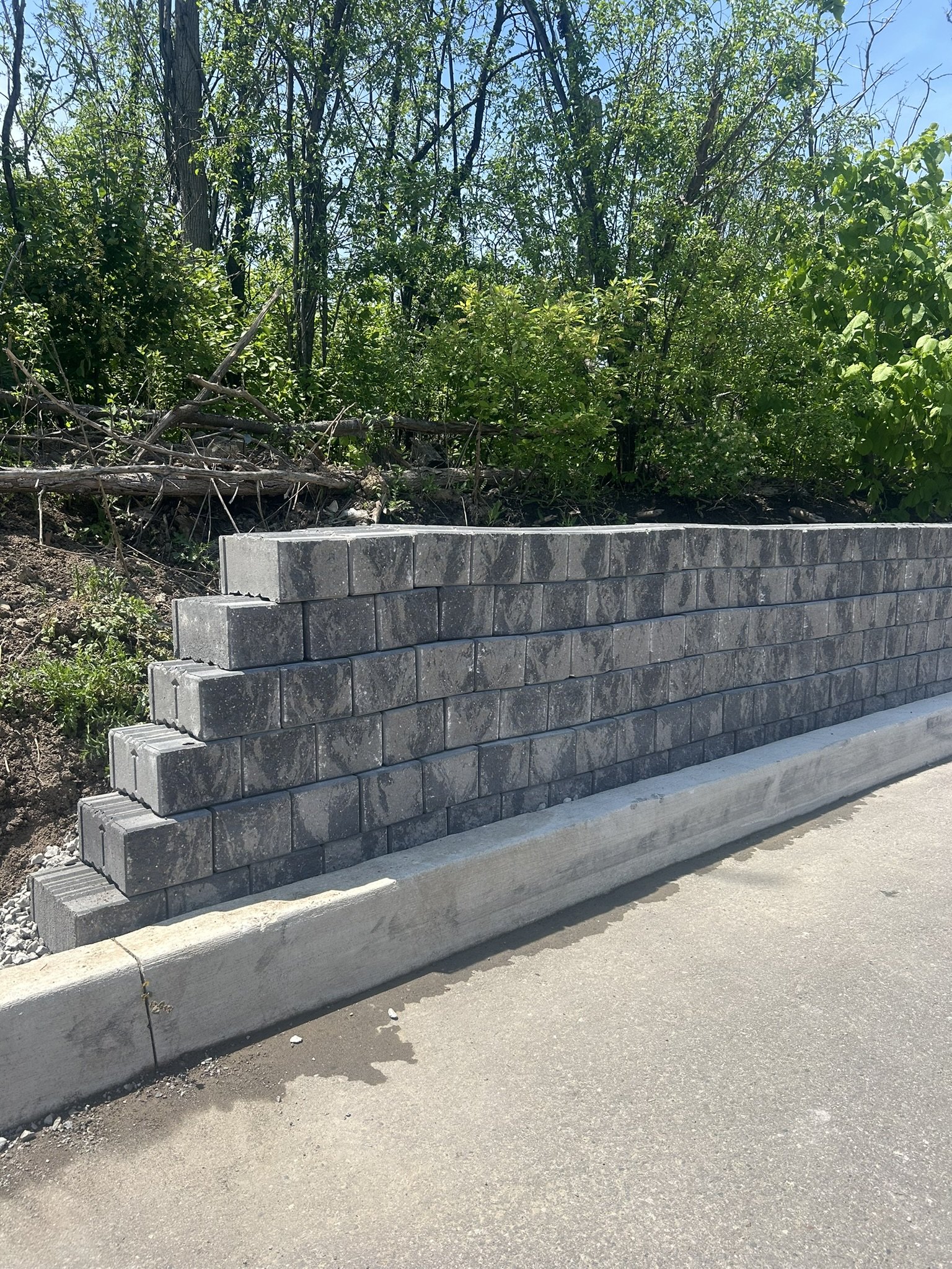 Setback visible. Each pair of courses steps back into the slope